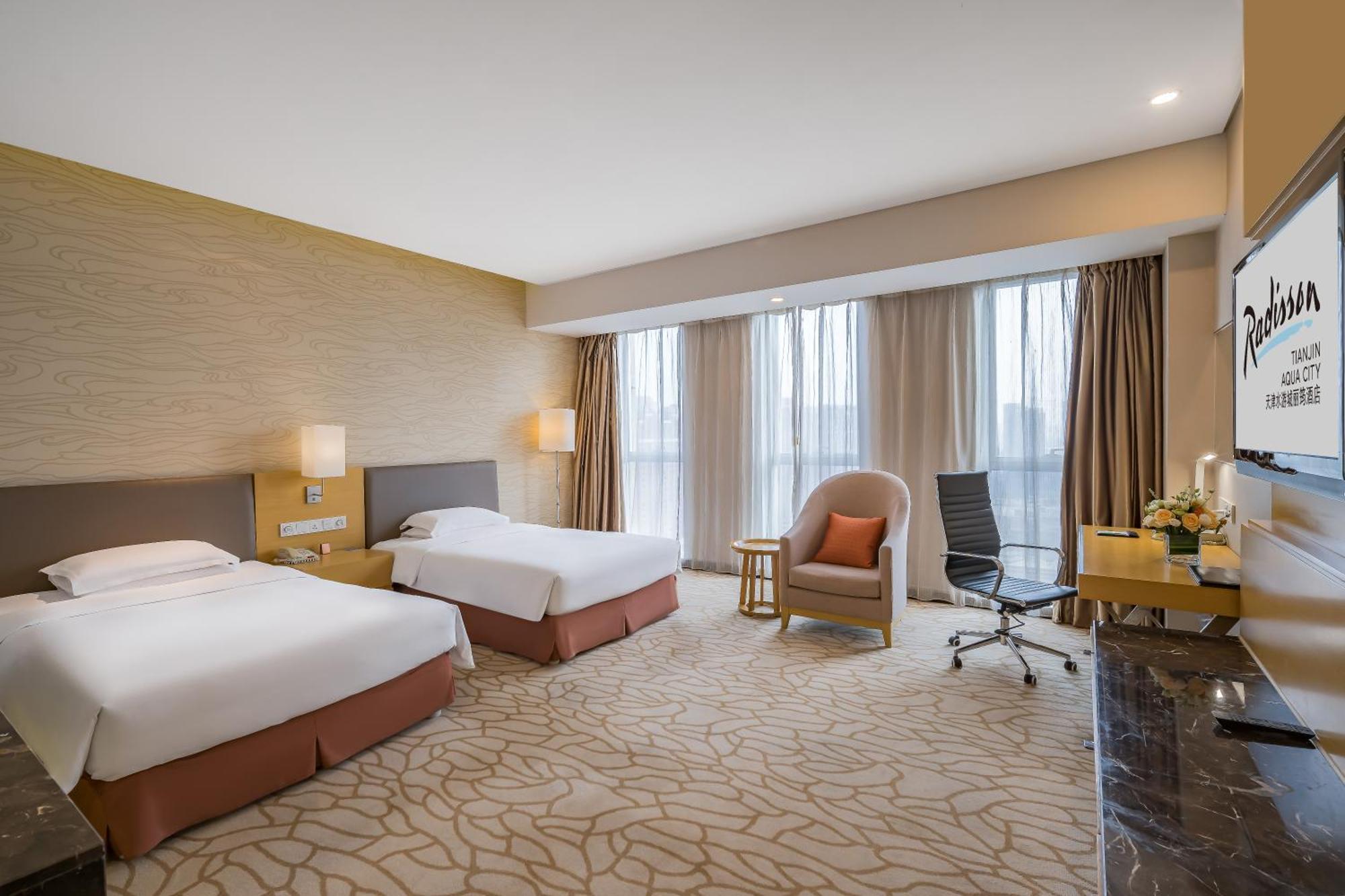 Radisson Hotel Tianjin Aqua City Экстерьер фото