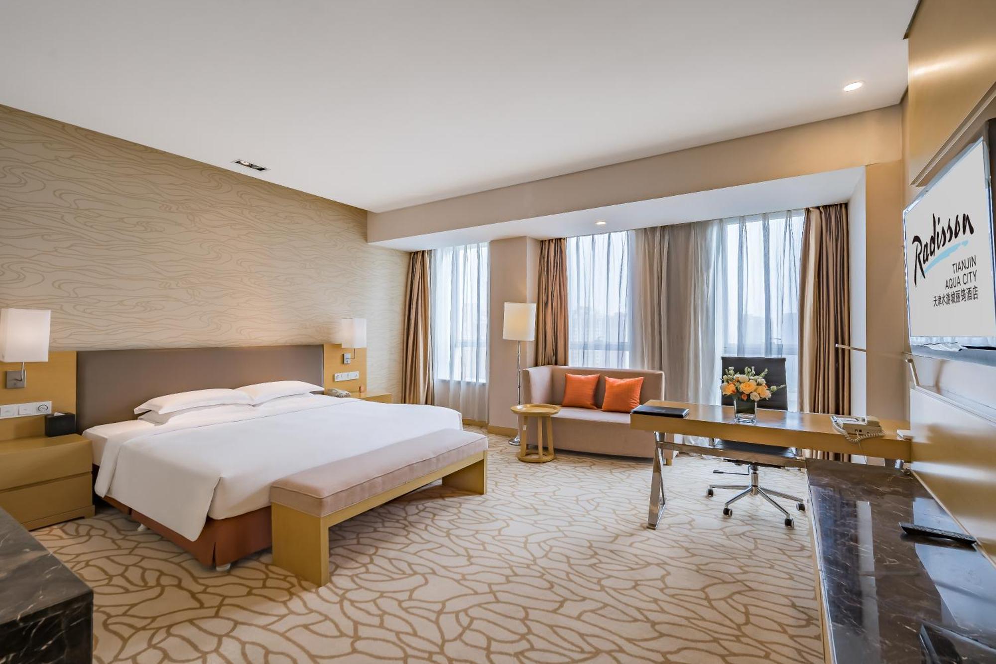 Radisson Hotel Tianjin Aqua City Экстерьер фото