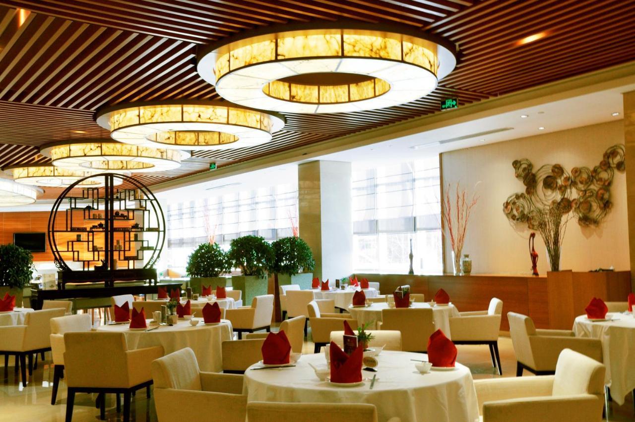 Radisson Hotel Tianjin Aqua City Экстерьер фото